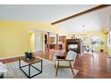 Spacious living area with fireplace, open layout, and hardwood flooring at 10333 E 211Th St, Noblesville, IN 46062