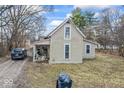 Exterior view of the home featuring simple design and classic siding at 2123 N F St, Elwood, IN 46036