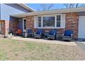 Inviting front porch area with comfortable seating, perfect for relaxing and enjoying the outdoors at 425 Conduitt Dr, Mooresville, IN 46158