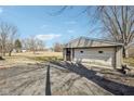 A detached single car garage, with visible driveway and yard space at 4709 S County Road 500 E, Plainfield, IN 46168