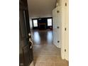 Inviting living room showcases gleaming hardwood floors and a cozy fireplace, perfect for relaxation at 5832 Cabot Dr, Indianapolis, IN 46221