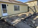 Back patio with space to grill out, relax and enjoy the weather at 654 Holiday Dr, Fortville, IN 46040