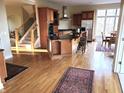 Spacious kitchen with wooden cabinetry, a center island, and stainless steel appliances at 12227 Redgold Run, Carmel, IN 46032