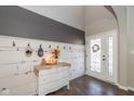 Charming entryway with decorative wall paneling and stylish decor at 1773 Winchester Blvd, Avon, IN 46123