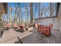 Large deck with fire pit and ample seating, ideal for entertaining guests at 2408 E Stafford Pl, Martinsville, IN 46151