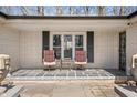 Inviting front porch with seating, perfect for relaxing outdoors with a view at 2408 E Stafford Pl, Martinsville, IN 46151