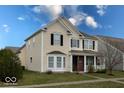 Inviting two-story home with well-manicured lawn and appealing facade at 3432 Shepperton Blvd, Indianapolis, IN 46228