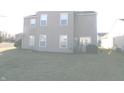 Spacious backyard featuring a well-maintained lawn and a patio at 6651 Sonesta Dr, Indianapolis, IN 46217