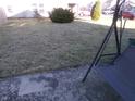 Good-sized grass backyard featuring a swing and an area for relaxing at 6651 Sonesta Dr, Indianapolis, IN 46217