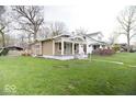 Landscaped yard and view of the home, showcasing the home's setting at 4504 Winthrop Ave, Indianapolis, IN 46205