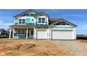New two-story home with two-car garage ready for siding and finishing touches at 5908 Agogo Way, Greenwood, IN 46143