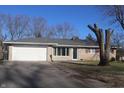 Well-maintained ranch-style home with an attached two-car garage and a brick front at 8137 S Delaware St, Indianapolis, IN 46227