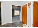 Inviting entryway featuring tiled floors and a conveniently located coat closet near the home's entry at 616 Gibbs Ct, Plainfield, IN 46168