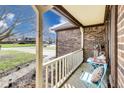 Cozy covered porch with seating, perfect for relaxing outdoors at 7152 Sandalwood Dr, Avon, IN 46123