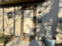 Close up of front door, including the address and decorative accents at 7902 Benjamin Dr, Lawrence, IN 46226