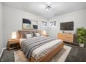 Comfortable main bedroom with a queen bed, bedside tables, and soft lighting at 110 Pleasant Run Dr, Markleville, IN 46056