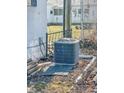 Image showing a Carrier-brand air conditioner unit with surrounding yard debris at 1303 S D St, Elwood, IN 46036
