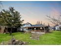 A relaxing backyard with a deck at 3120 Central Ave, Anderson, IN 46016