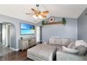 Cozy living room with a large sectional sofa, mounted TV, and modern decor at 136 Meadow Glen Dr, Avon, IN 46123