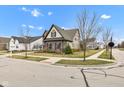 Well-maintained corner lot featuring attractive landscaping and a charming home exterior at 1521 Avondale Dr, Westfield, IN 46074