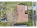 Aerial view of home displaying roof and yard, highlighting its position within the neighborhood at 1620 S East St, Lebanon, IN 46052