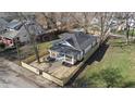An aerial perspective showing a renovated home and new fence at 1822 N Dexter St, Indianapolis, IN 46202