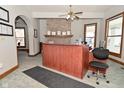 Inviting reception area features a brick fireplace, wood reception desk, and neutral decor at 32 E Main St, Mooresville, IN 46158