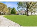 A charming home with mature trees and a well-manicured lawn at 3548 W 500 North Rd, McCordsville, IN 46055