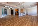Spacious living area features hardwood floors, high ceilings, and an open layout leading to the kitchen at 110 E Washington St # 802, Indianapolis, IN 46204