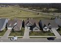 Charming home with professionally landscaped yard, and walking distance to nearby green spaces and walking paths at 14049 Trueblood Ln, Carmel, IN 46033