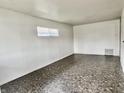 Bright and airy living room with neutral walls, a large window, and vinyl floors at 151 N 8Th Ave, Beech Grove, IN 46107