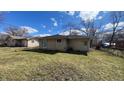 Expansive backyard featuring a well-maintained lawn and mature trees at 3830 Aloda St, Indianapolis, IN 46203