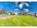 Lovely single-story home with a lush green lawn and a neatly paved driveway at 868 Glendale Dr, Franklin, IN 46131