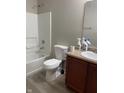 Full bathroom with a shower and tub combination and neutral-toned vanity at 125 Hilltop Farms Blvd, Whiteland, IN 46184