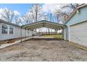 Spacious carport offering covered parking and protection from the elements for vehicles and equipment at 2305 S Rybolt Ave, Indianapolis, IN 46241