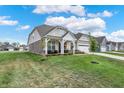 A lovely single-Gathering home with a well-maintained lawn in a quiet neighborhood at 2795 Lanai Ln, Greenwood, IN 46143