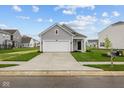 Beautiful single-Gathering home with a well-maintained lawn and long driveway at 5138 Modernist Blvd, Indianapolis, IN 46237