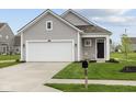 Well-kept home with a manicured lawn and lovely curb appeal at 5138 Modernist Blvd, Indianapolis, IN 46237