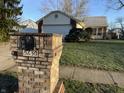 Charming home featuring brick mailbox, walkway and well-manicured front lawn at 5730 Pemberly Dr, Indianapolis, IN 46221