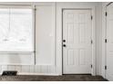 Bright, neutral room featuring white trim, a large window and an interior door at 2835 S Lyons Ave, Indianapolis, IN 46241