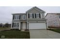 Charming two-story home with gray siding, black shutters, and an attached two-car garage at 3913 Highcrest Rd, Indianapolis, IN 46239