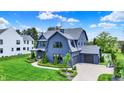 Beautiful home featuring manicured lawn, driveway, and charming curb appeal at 5120 Melbourne Pl, Zionsville, IN 46077