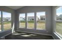 Bright sunroom showcasing views of the backyard at 10609 Banyan Wood Ct, Indianapolis, IN 46239