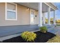 Inviting front porch with fresh landscaping, perfect for relaxing outdoors at 350 N Belleview Pl, Indianapolis, IN 46222