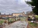 View of a yard with shed or outbuilding, showing potential for storage or hobbies at 7154 S 325 W, Jamestown, IN 46147