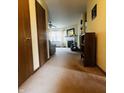 Spacious living room featuring plush carpeting and a cozy fireplace at 7399 Glendale Dr, Avon, IN 46123