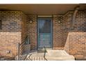 Close-up of the front entrance showcasing brickwork and an inviting doorway at 3875 Offshore Dr, Columbus, IN 47203
