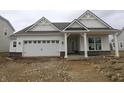 New construction home featuring white siding, brick accents, an attached garage, and covered front porch at 4016 Bozeman Way, Bargersville, IN 46106