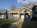 Inviting single-story home featuring a covered front porch and traditional design at 1124 Victory Ct, Anderson, IN 46016