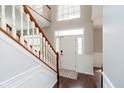 Inviting foyer with hardwood floors, grand staircase, and abundant natural light at 15638 River Birch Rd, Westfield, IN 46074